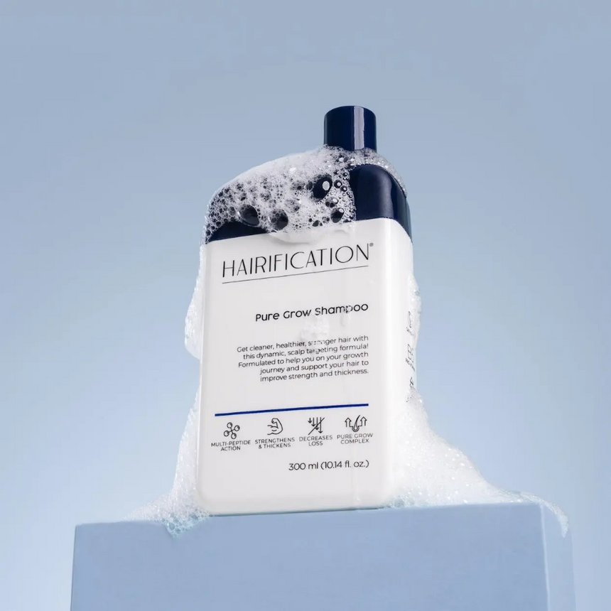 Hairification Pure Grow Shampoo 300ml showcased against a soft blue backdrop.