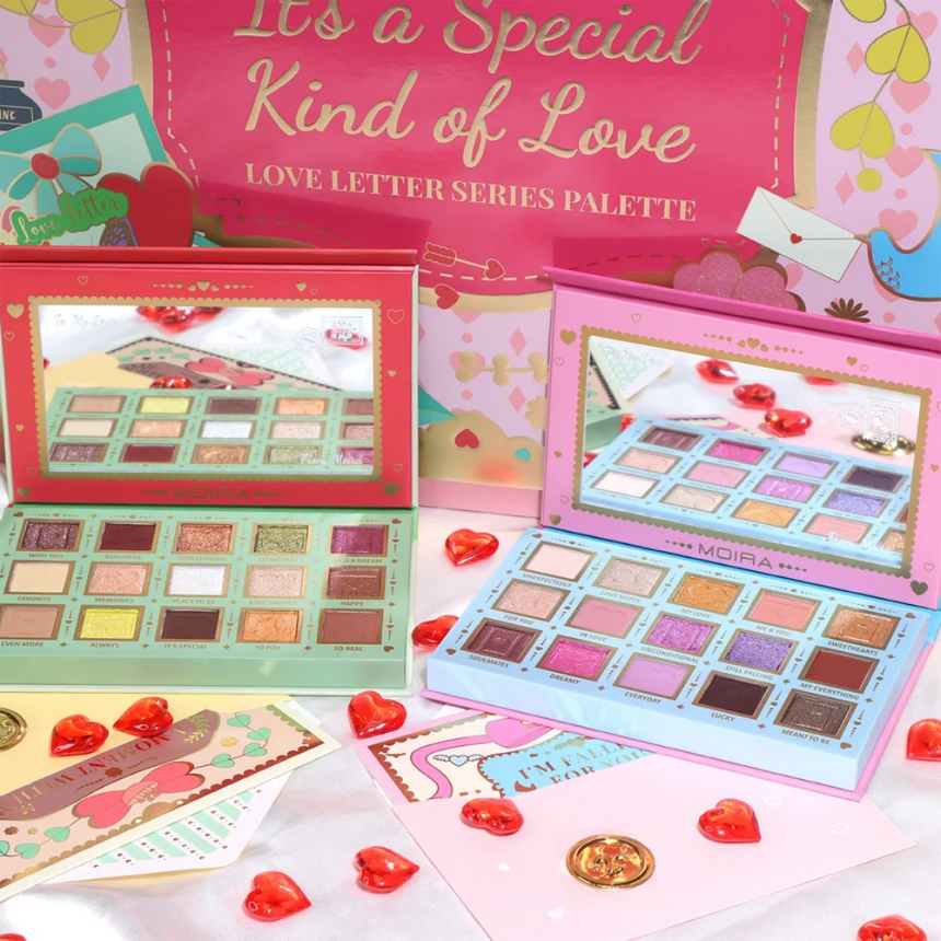 Moira Love Letter Series eyeshadow palettes displayed against a colourful backdrop.