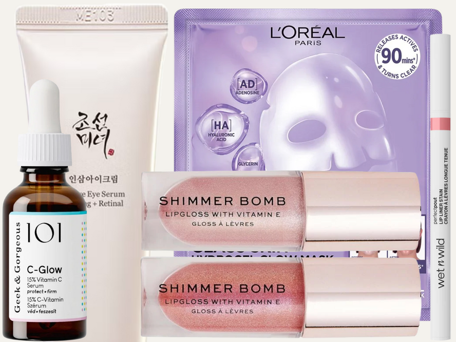 A flatlay of the best beauty products under £15, featuring affordable skincare, makeup and haircare buys including serums, mascara, lip gloss and hair treatment sprays