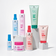 A variety of Schwarzkopf Professional products displayed on a white studio backdrop.