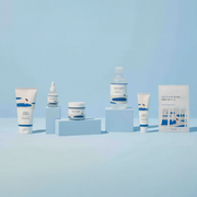 Showcased are a variety of Round Lab products displayed on a light blue background.
