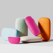A variety of Fussy products displayed against a light grey backdrop.