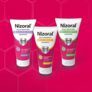 Nizoral scalp care shampoos for dry, eczema-prone, dandruff-prone and itchy sensitive scalps, displayed against a bright pink patterned background.