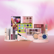 Moira makeup products displayed against a colourful backdrop.