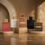 A variety of Rayhaan Frangrances displayed in a modern marble background.