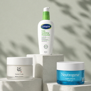 Beauty of Joseon Dynasty Cream, Cetaphil Daily Hydrating Moisturiser and Neutrogena Hydro Boost Water Gel displayed on white plinths against a soft neutral backdrop with leafy shadows.