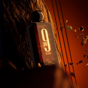 Showcased is a Afnan fragrance in a amber background surrounded by sharp scents.