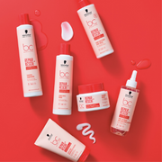 Schwarzkopf Professional Repair Rescue range displayed against a red backdrop.