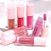 Various shades of Moira Love Steady Liquid Blush displayed against a white backdrop.