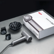 Tymo AirHype Lite High-Speed Hair Dryer with various different heads displayed on a dark studio backdrop.