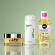 Elemis Pro-Collagen Cleansing Balm, Dermalogica Clear Start Breakout Clearing Foaming Wash and Nivea Micellar Water Skin Glow displayed against a soft green backdrop.