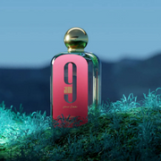 An Afnan fragrance is displayed in a light, earthy setting.
