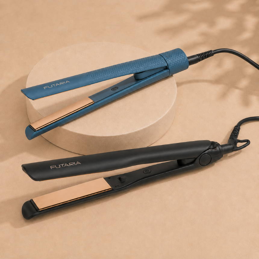 Head Jog Hair Straighteners in black and blue displayed on a minimalistic beige setting.