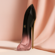 Carolina Herrera Good Girl women’s fragrance bottle displayed against a soft blush pink background.